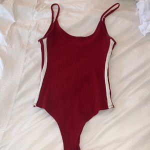 Red bodysuit w/ white stripes on side